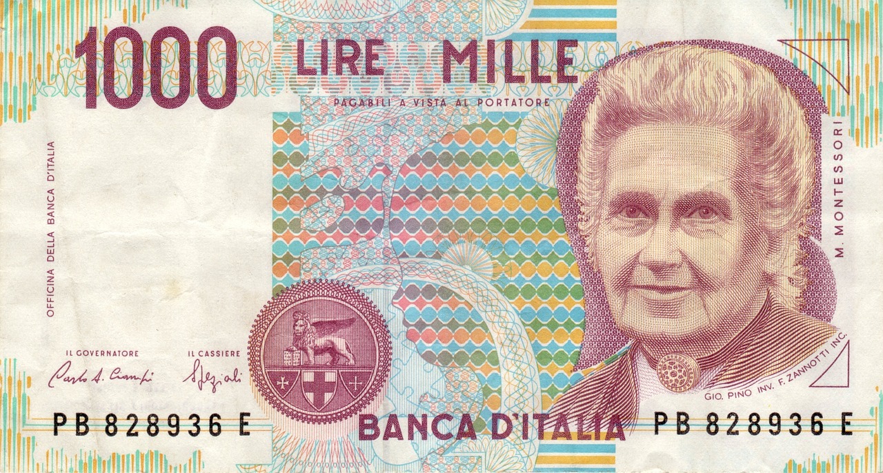 Moneta da 1000 Lire con ritratto di Maria Montessori su sfondo neutro.
